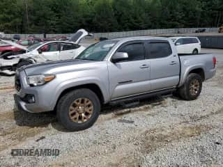 2018 Toyota Tacoma SR5 z VIN 5TFAZ5CN4JX067059, wystawiony jako Copart lot #60420515 z przebiegiem 91 598 mil mil oraz Szkoda całkowita • Salvage title. Historia ofert i sprzedaży dostępna na DreamBid. Obrazek 1.