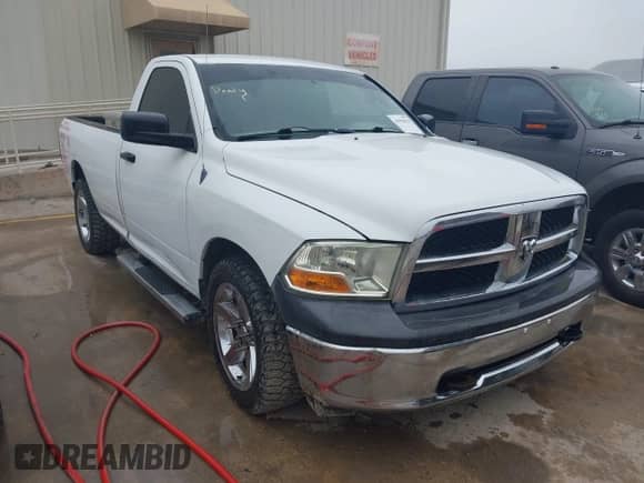 2012 Ram 1500 ST z VIN 3C6JD6DP9CG201129, wystawiony jako IAAI lot #41910314 z przebiegiem 257 828 mil mil oraz . Historia ofert i sprzedaży dostępna na DreamBid. Obrazek 1.