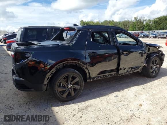 2023 Hyundai Santa Cruz Night Edition with VIN 5NTJCDAF4PH064773, listed as a Copart auction lot 70690834 with 30,310 mi miles and Salvage title. Bid and sale history available at DreamBid. Image 3.