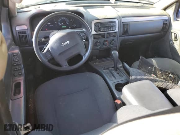 2002 Jeep Grand Cherokee Laredo with VIN 1J4GX48S92C313728, listed as a Copart auction lot 83966235 with 238,949 mi miles and Clean title. Bid and sale history available at DreamBid. Image 8.