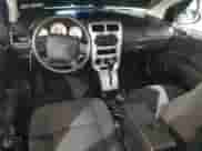 2008 Dodge Caliber SE with VIN 1B3HB28B78D779417, listed as a Copart auction lot 71234075 with 80,645 mi miles and Salvage title. Bid and sale history available at DreamBid. Image 8.