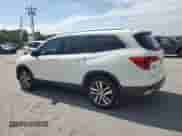 2017 Honda Pilot Touring with VIN 5FNYF6H91HB064701, listed as a Copart auction lot 81267865 with 209,701 mi miles and Salvage title. Bid and sale history available at DreamBid. Image 2.