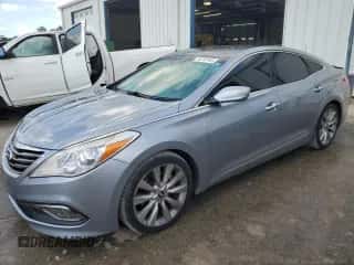 2016 Hyundai Azera Limited с VIN KMHFH4JGXGA513455, выставлен на аукционе Copart как лот 74213144 с пробегом 156 300 миль миль и Списание • Salvage title. История ставок и продаж доступна на DreamBid. Изображение 1.