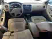 1998 Honda Accord LX z VIN 1HGCG5645WA153610, wystawiony jako Copart lot #71256675 z przebiegiem 215 832 mil mil oraz Szkoda całkowita • Salvage title. Historia ofert i sprzedaży dostępna na DreamBid. Obrazek 8.