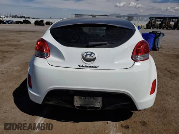 2013 Hyundai Veloster w/Gray Int z VIN KMHTC6AD9DU162101, wystawiony jako Copart lot #71926675 z przebiegiem 44 981 mil mil oraz Szkoda całkowita • Salvage title. Historia ofert i sprzedaży dostępna na DreamBid. Obrazek 6.