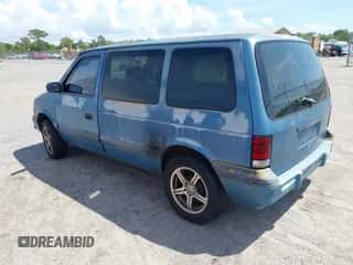 1994 Dodge Caravan with VIN 2B4GH25K4RR517492, listed as a IAAI auction lot 41940051 with 241,574 mi miles and . Bid and sale history available at DreamBid. Image 3.