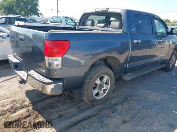 2008 Toyota Tundra with VIN 5TBDV54158S520845, listed as a IAAI auction lot 42857722 with 77,338 mi miles and . Bid and sale history available at DreamBid. Image 4.