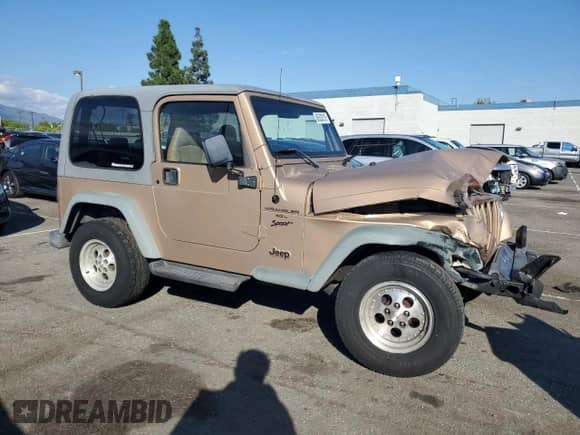 1999 Jeep Wrangler Sport with VIN 1J4FY19S9XP417531, listed as a Copart auction lot 86538315 with 161,004 mi miles and Salvage title. Bid and sale history available at DreamBid. Image 4.