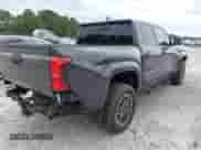 2024 Toyota Tacoma TRD Off Road with VIN 3TMLB5JN9RM060836, listed as a IAAI auction lot 43181595 with 21,563 mi miles and . Bid and sale history available at DreamBid. Image 4.