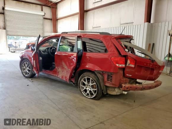 2012 Dodge Journey R/T with VIN 3C4PDDEG4CT258142, listed as a Copart auction lot 71326495 with 155,227 mi miles and Salvage title. Bid and sale history available at DreamBid. Image 2.