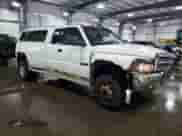 2001 Dodge 3500 with VIN 1B7MF33761J516885, listed as a Copart auction lot 66725035 with 368,696 mi miles and Salvage title. Bid and sale history available at DreamBid. Image 4.