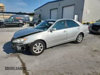 2005 Toyota Camry LE с VIN 4T1BF30KX5U084723, выставлен на аукционе Copart как лот 80690275 с пробегом 170 842 миль миль и Списание • Salvage title. История ставок и продаж доступна на DreamBid. Изображение 1.