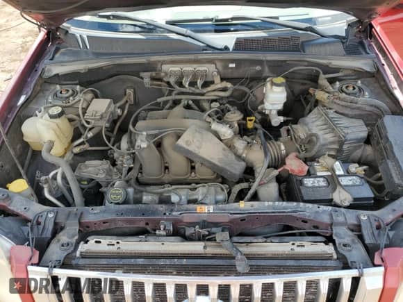 2008 Mercury Mariner Premier with VIN 4M2CU97188KJ38500, listed as a Copart auction lot 56255015 with 171,811 mi miles and Salvage title. Bid and sale history available at DreamBid. Image 11.