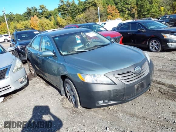 2007 Toyota Camry LE z VIN 4T1BK46K27U524011, wystawiony jako IAAI lot #43478790 z przebiegiem 146 391 mil mil oraz . Historia ofert i sprzedaży dostępna na DreamBid. Obrazek 1.