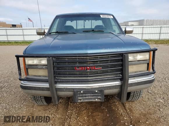 1991 GMC Sierra 1500 SLT z VIN 2GTEK19Z4M1542137, wystawiony jako Copart lot #68024074 z przebiegiem 347 281 mil mil oraz Szkoda całkowita • Salvage title. Historia ofert i sprzedaży dostępna na DreamBid. Obrazek 5.