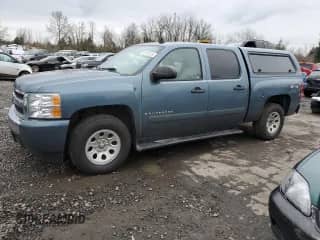 2007 Chevrolet Silverado 1500 LS with VIN 2GCEK13C771544361, listed as a Copart auction lot 45721515 with 100,636 mi miles and Salvage title. Bid and sale history available at DreamBid. Image 1.