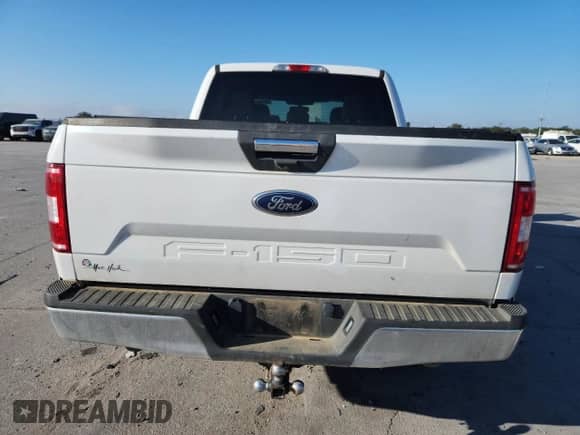 2020 Ford F-150 XLT с VIN 1FTEW1E55LFB38276, выставлен на аукционе Copart как лот 86128785 с пробегом 156 671 миль миль и Списание • Salvage title. История ставок и продаж доступна на DreamBid. Изображение 6.