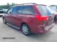 2008 Toyota Sienna LE with VIN 5TDBK23C28S013992, listed as a IAAI auction lot 42591757 with 125,641 mi miles and . Bid and sale history available at DreamBid. Image 3.