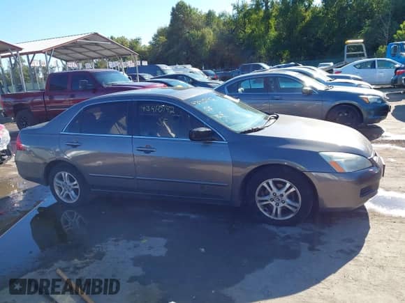 2006 Honda Accord EX z VIN 1HGCM567X6A122159, wystawiony jako IAAI lot #43410142 z przebiegiem 191 536 mil mil oraz . Historia ofert i sprzedaży dostępna na DreamBid. Obrazek 13.