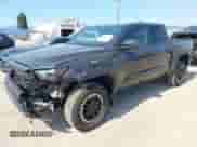 2024 Toyota Tacoma TRD Off Road with VIN 3TMLB5JN7RM069938, listed as a IAAI auction lot 43056789 with 6,837 mi miles and . Bid and sale history available at DreamBid. Image 2.