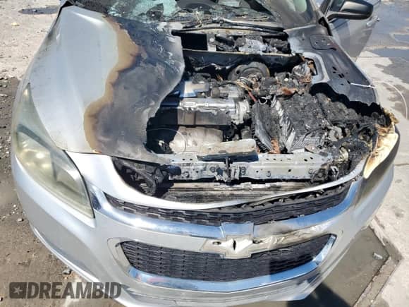 2015 Chevrolet Malibu LS z VIN 1G11B5SL9FF156006, wystawiony jako Copart lot #81767895 z przebiegiem Nie podano mil oraz Szkoda całkowita • Salvage title. Historia ofert i sprzedaży dostępna na DreamBid. Obrazek 11.