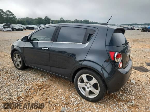 2015 Chevrolet Sonic LTZ с VIN 1G1JE6SBXF4207609, выставлен на аукционе Copart как лот 67843195 с пробегом 138 970 миль миль и Списание • Salvage title. История ставок и продаж доступна на DreamBid. Изображение 2.
