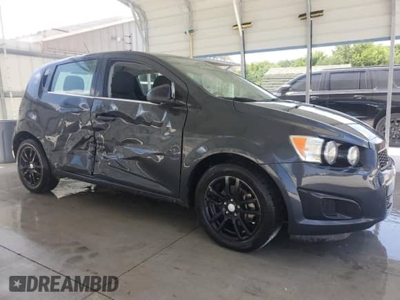 2014 Chevrolet Sonic LT с VIN 1G1JC6SB2E4157907, выставлен на аукционе Copart как лот 65535675 с пробегом 84 479 миль миль и Списание • Salvage title. История ставок и продаж доступна на DreamBid. Изображение 4.