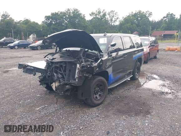 2018 Chevrolet Tahoe Commercial with VIN 1GNLCDEC9JR260688, listed as a IAAI auction lot 42699270 with Not provided miles and . Bid and sale history available at DreamBid. Image 18.