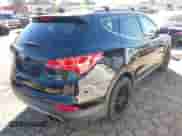 2014 Hyundai Santa Fe with VIN 5XYZUDLAXEG151453, listed as a IAAI auction lot 43479084 with 127,090 mi miles and . Bid and sale history available at DreamBid. Image 4.
