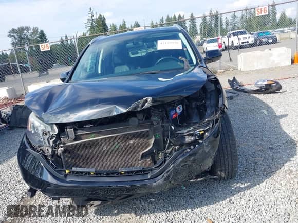 2014 Honda CR-V EX-L with VIN 2HKRM4H7XEH652221, listed as a IAAI auction lot 43175926 with 108,135 mi miles and . Bid and sale history available at DreamBid. Image 13.