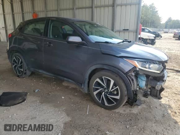 2021 Honda HR-V LX с VIN 3CZRU5H3XMM715212, выставлен на аукционе Copart как лот 81039495 с пробегом 103 696 миль миль и На запчасти • Non repairable. История ставок и продаж доступна на DreamBid. Изображение 4.