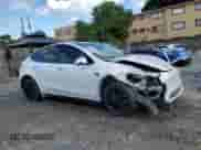 2021 Tesla Model Y Long Range with VIN 5YJYGDEE8MF092993, listed as a Copart auction lot 81125165 with 47,072 mi miles and Non repairable. Bid and sale history available at DreamBid. Image 4.