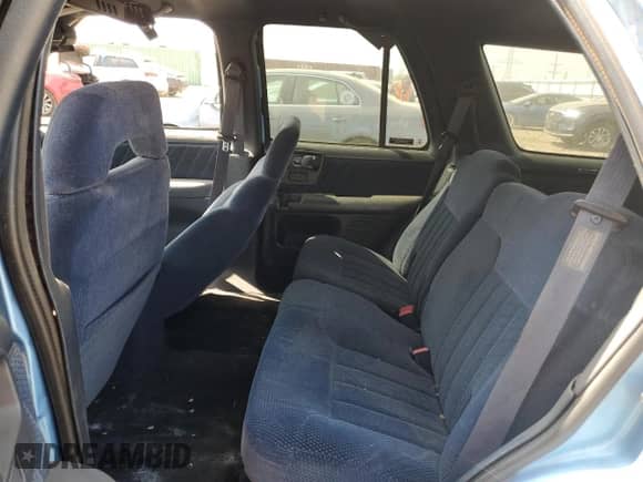 1997 Chevrolet Blazer LS with VIN 1GNDT13W6V2137154, listed as a Copart auction lot 56912355 with 213,487 mi miles and Salvage title. Bid and sale history available at DreamBid. Image 11.