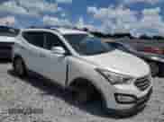 2014 Hyundai Santa Fe with VIN 5XYZU3LA1EG226129, listed as a Copart auction lot 65032845 with 140,450 mi miles and Salvage title. Bid and sale history available at DreamBid. Image 4.