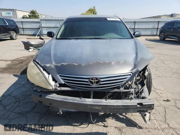 2006 Toyota Camry STD с VIN JTDBE32KX63057064, выставлен на аукционе Copart как лот 87117575 с пробегом 228 136 миль миль и Списание • Salvage title. История ставок и продаж доступна на DreamBid. Изображение 5.