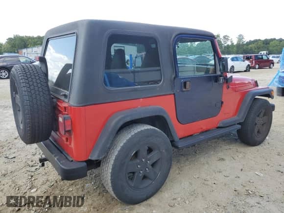 1997 Jeep Wrangler SE with VIN 1J4FY29P2VP473972, listed as a Copart auction lot 70339135 with 243,412 mi miles and Salvage title. Bid and sale history available at DreamBid. Image 3.