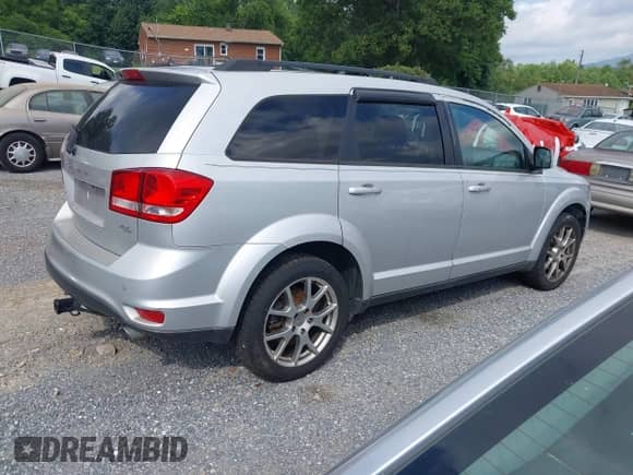 2014 Dodge Journey R/T z VIN 3C4PDDEG7ET139410, wystawiony jako IAAI lot #42808542 z przebiegiem 185 712 mil mil oraz . Historia ofert i sprzedaży dostępna na DreamBid. Obrazek 4.