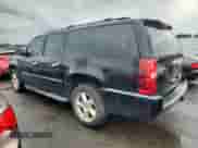 2010 Chevrolet Suburban LTZ with VIN 1GNUKKE37AR245330, listed as a Copart auction lot 64144765 with 243,618 mi miles and Clean title. Bid and sale history available at DreamBid. Image 2.