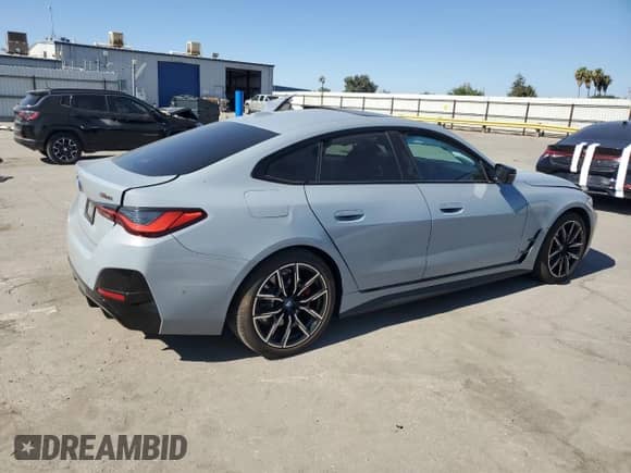 2024 BMW i4 M50 with VIN WBY33AW00RFS44550, listed as a Copart auction lot 63332305 with 10,114 mi miles and Salvage title. Bid and sale history available at DreamBid. Image 3.