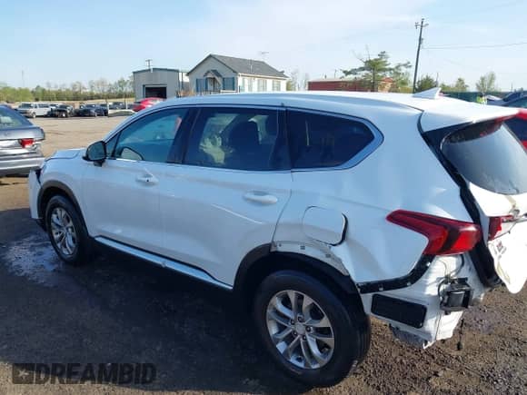 2019 Hyundai Santa Fe SEL Plus with VIN 5NMS3CAD2KH130366, listed as a IAAI auction lot 42067142 with 62,909 mi miles and . Bid and sale history available at DreamBid. Image 3.