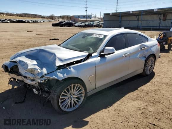 2015 BMW 4 Series 435i xDrive with VIN WBA4B3C53FGV48544, listed as a Copart auction lot 47663145 with 89,916 mi miles and Salvage title. Bid and sale history available at DreamBid. Image 1.