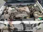 1997 Toyota Tacoma z VIN 4TAWN72N4VZ239482, wystawiony jako Copart lot #56564145 z przebiegiem 151 318 mil mil oraz Szkoda całkowita • Salvage title. Historia ofert i sprzedaży dostępna na DreamBid. Obrazek 11.