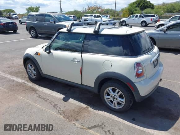 2012 MINI Hardtop with VIN WMWSU3C50CT255544, listed as a IAAI auction lot 42533243 with 102,422 mi miles and . Bid and sale history available at DreamBid. Image 3.