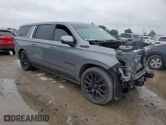 2022 Chevrolet Suburban High Country with VIN 1GNSKGKL4NR174604, listed as a Copart auction lot 55703135 with 21,949 mi miles and Salvage title. Bid and sale history available at DreamBid. Image 4.