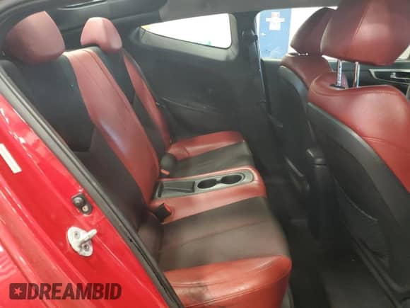 2012 Hyundai Veloster w/Red Int z VIN KMHTC6AD0CU027782, wystawiony jako Copart lot #81558205 z przebiegiem 104 484 mil mil oraz Szkoda całkowita • Salvage title. Historia ofert i sprzedaży dostępna na DreamBid. Obrazek 10.