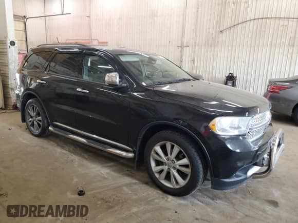 2012 Dodge Durango Crew with VIN 1C4RDJDG6CC212770, listed as a Copart auction lot 80857175 with 187,151 mi miles and Clean title. Bid and sale history available at DreamBid. Image 4.