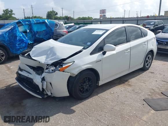 2015 Toyota Prius Four z VIN JTDKN3DU7F1917285, wystawiony jako IAAI lot #42536395 z przebiegiem 265 498 mil mil oraz . Historia ofert i sprzedaży dostępna na DreamBid. Obrazek 2.