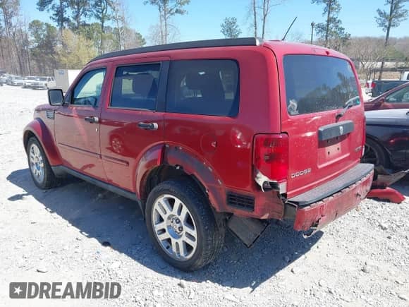 2010 Dodge Nitro SE with VIN 1D4PT2GK7AW142856, listed as a IAAI auction lot 41855687 with 197,248 mi miles and . Bid and sale history available at DreamBid. Image 3.