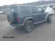 2021 Jeep Wrangler Unlimited Sahara z VIN 1C4JJXP65MW676726, wystawiony jako IAAI lot #41795701 z przebiegiem 38 480 mil mil oraz . Historia ofert i sprzedaży dostępna na DreamBid. Obrazek 4.