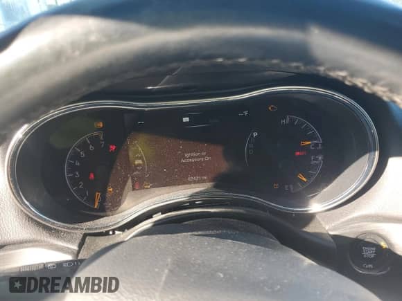 2021 Jeep Grand Cherokee Laredo E z VIN 1C4RJFAG0MC667223, wystawiony jako Copart lot #86490135 z przebiegiem 62 431 mil mil oraz Czysty tytuł • Clean title. Historia ofert i sprzedaży dostępna na DreamBid. Obrazek 9.